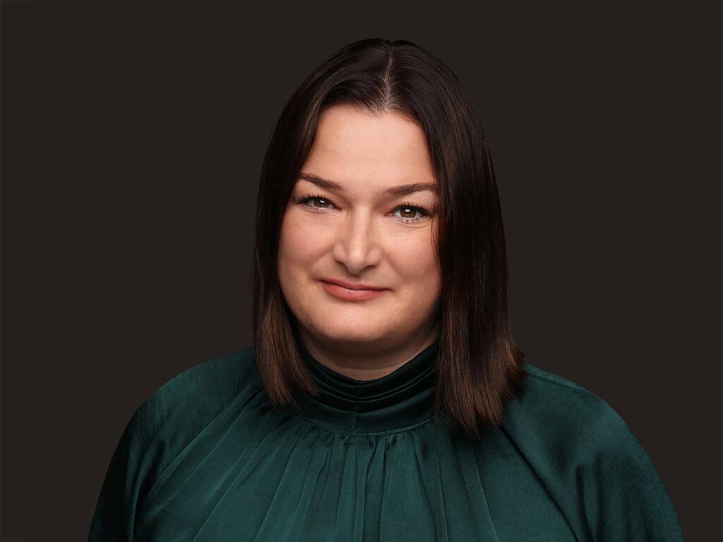 A studio-shot photo of Laura